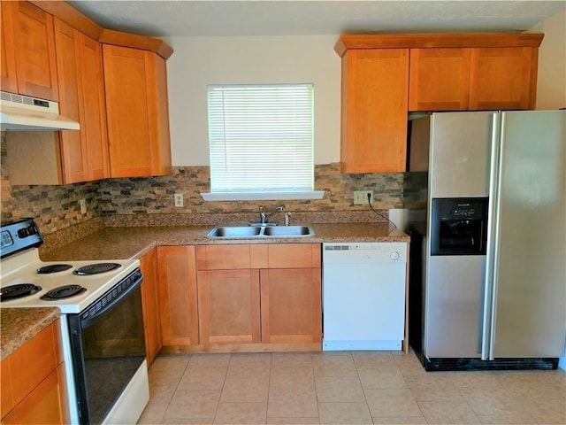295 Forest Pl, Lawrenceville, GA 30046 - kitchen with white appliances, under cabinet range hood, tasteful backsplash, and light tile patterned floors