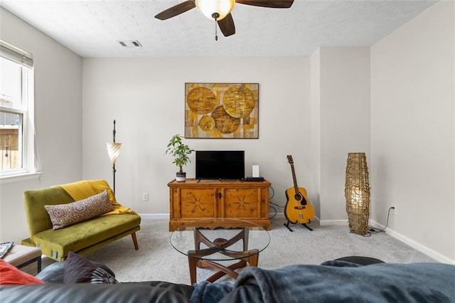 554 Rendevous Rd, Acworth, GA 30102 - living room featuring carpet floors, a ceiling fan, baseboards, and a textured ceiling