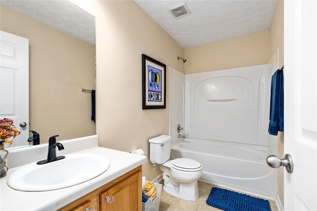 554 Rendevous Rd, Acworth, GA 30102 - bathroom featuring vanity, toilet, shower / washtub combination, a textured ceiling, and tile patterned flooring