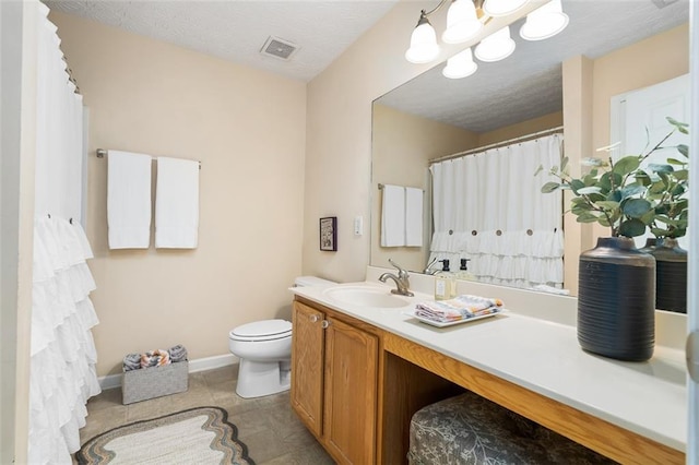 554 Rendevous Rd, Acworth, GA 30102 - full bath featuring toilet, vanity, baseboards, and tile patterned flooring