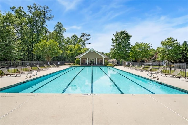 554 Rendevous Rd, Acworth, GA 30102 - community pool with a patio area and view of wooded area