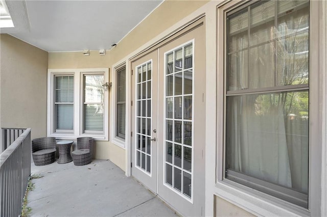balcony featuring french doors