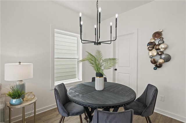 dining space with dark hardwood / wood-style flooring