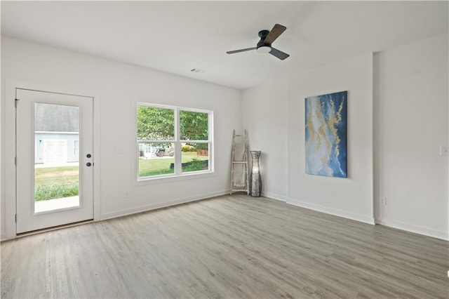 interior space featuring ceiling fan and wood-type flooring