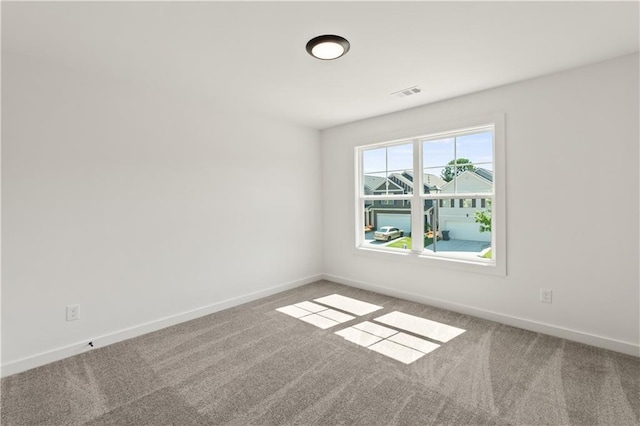 empty room with carpet floors