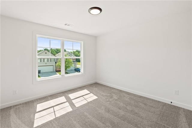 view of carpeted spare room