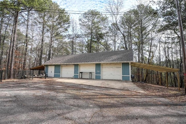 garage with a carport