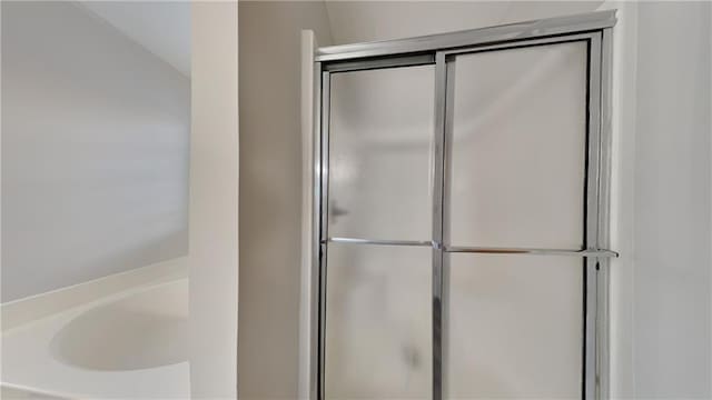 bathroom with an enclosed shower