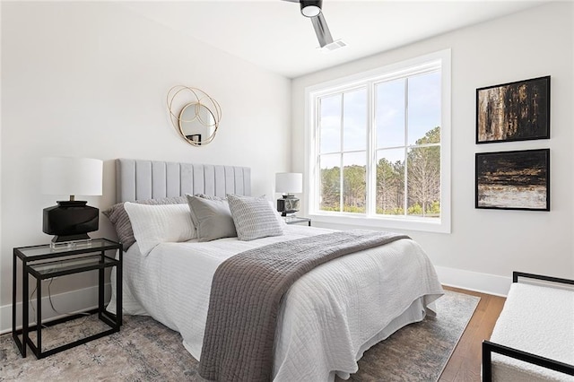 7220 Summit Pl, Alpharetta, GA 30009 - bedroom with wood finished floors and ceiling fan