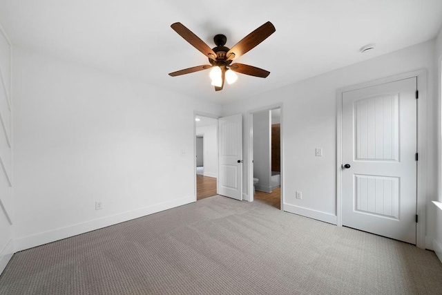 unfurnished bedroom with light carpet and ceiling fan