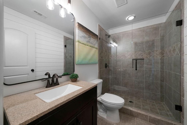 bathroom featuring walk in shower, vanity, and toilet