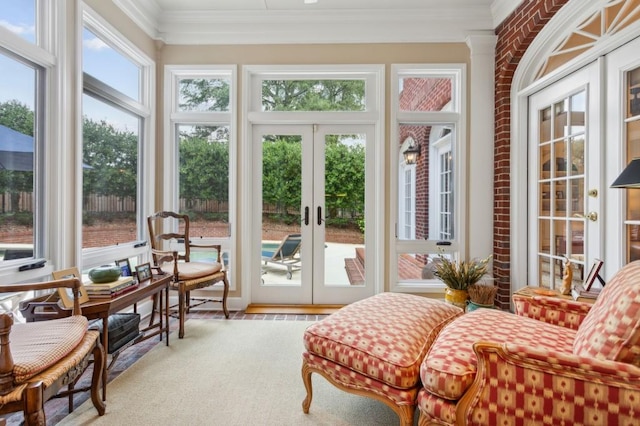 sunroom featuring french doors