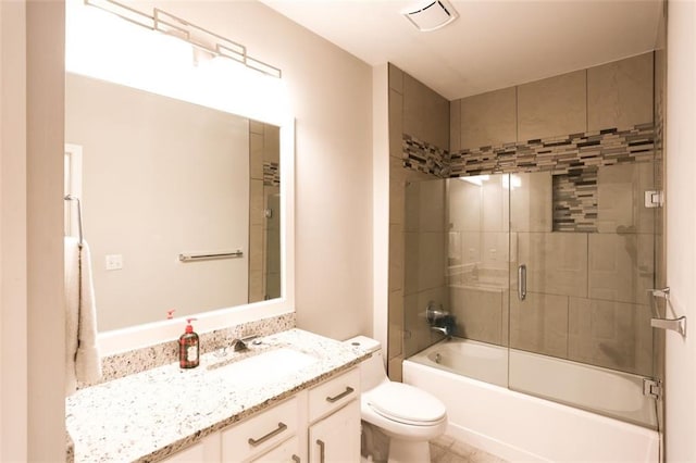 full bathroom with vanity, combined bath / shower with glass door, and toilet