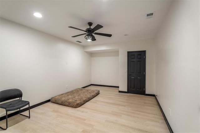 sitting room featuring light wood-style flooring, baseboards, ceiling fan, and recessed lighting