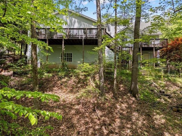 view of yard with a wooden deck