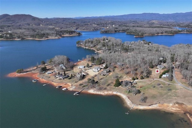 bird's eye view with a water and mountain view