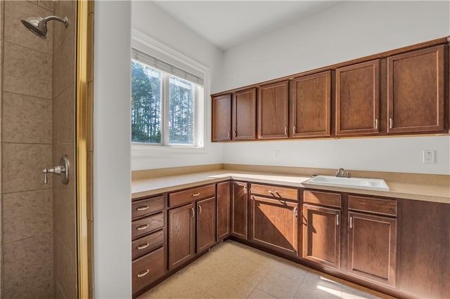 kitchen with light countertops and a sink