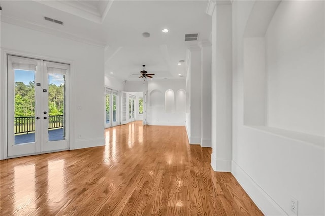 unfurnished living room with french doors, recessed lighting, visible vents, and light wood-style floors