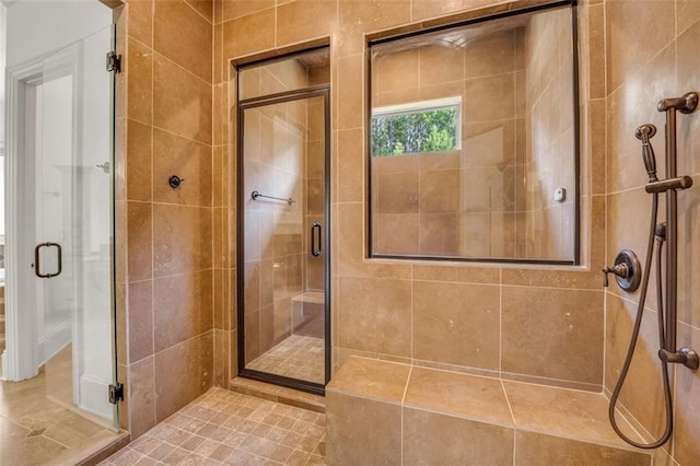 full bathroom featuring a shower stall