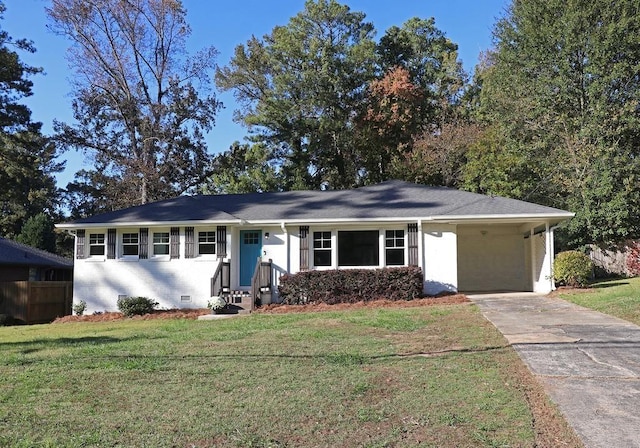 single story home with a front lawn and a carport