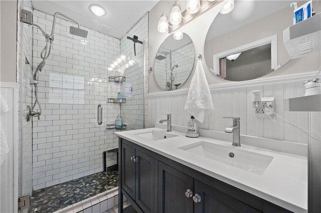 bathroom with vanity and walk in shower