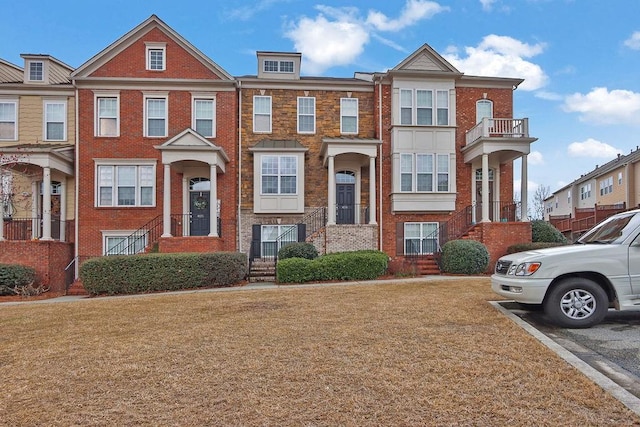 multi unit property featuring brick siding