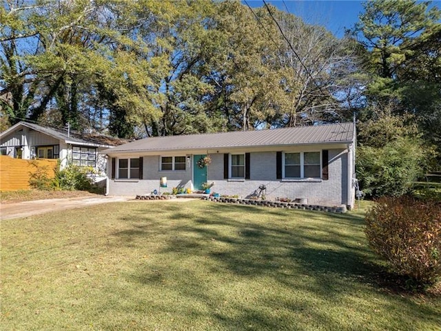 ranch-style house with a front lawn