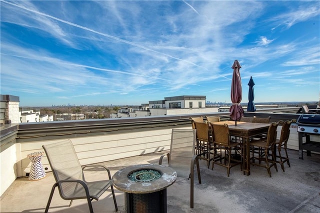 view of patio with a balcony