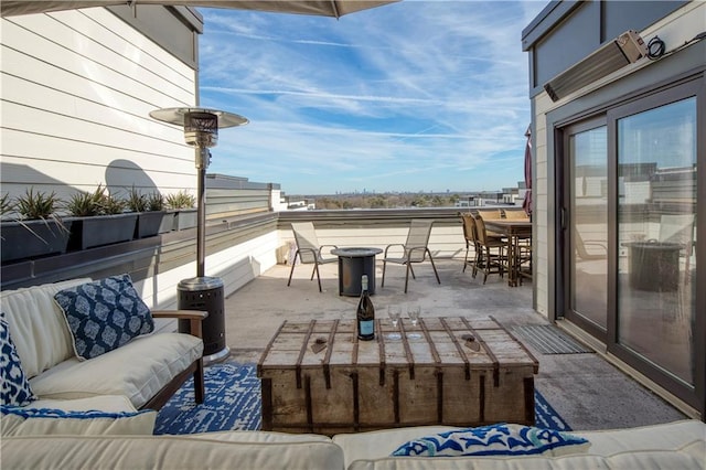 view of patio / terrace with an outdoor living space and outdoor dining space