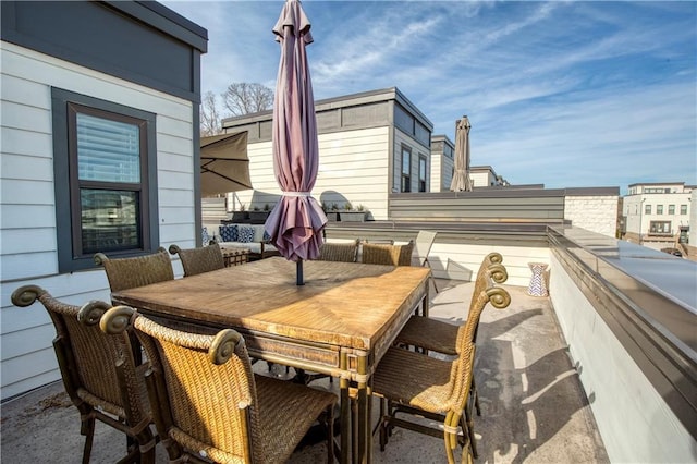 view of patio featuring outdoor dining space