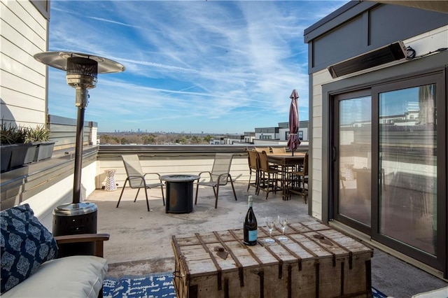 view of patio featuring outdoor dining area