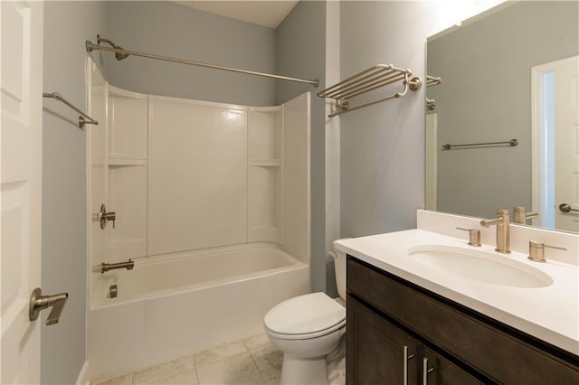 full bathroom with vanity, washtub / shower combination, and toilet