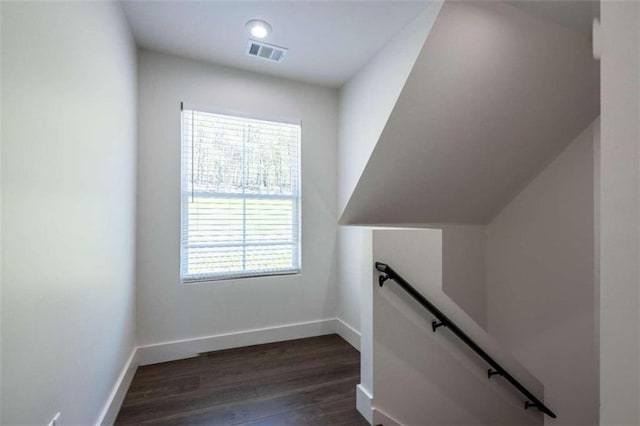 stairway with wood-type flooring