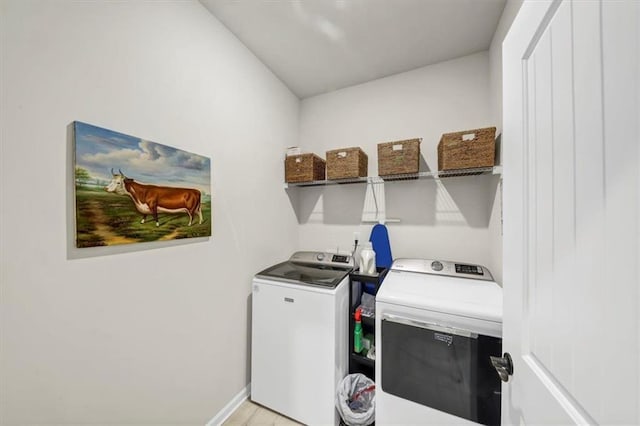 washroom with washer and clothes dryer