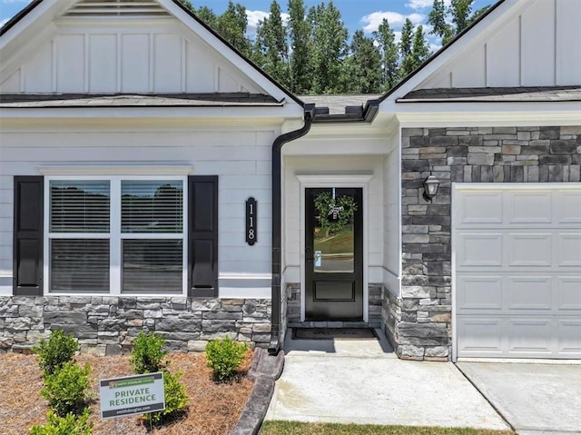 property entrance with a garage