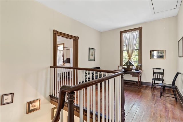 corridor featuring dark hardwood / wood-style floors