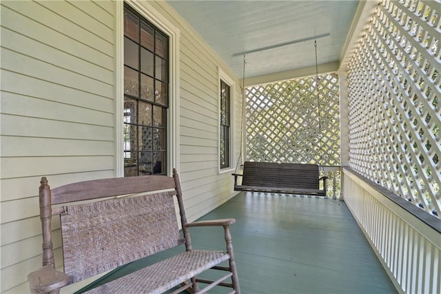 balcony featuring covered porch