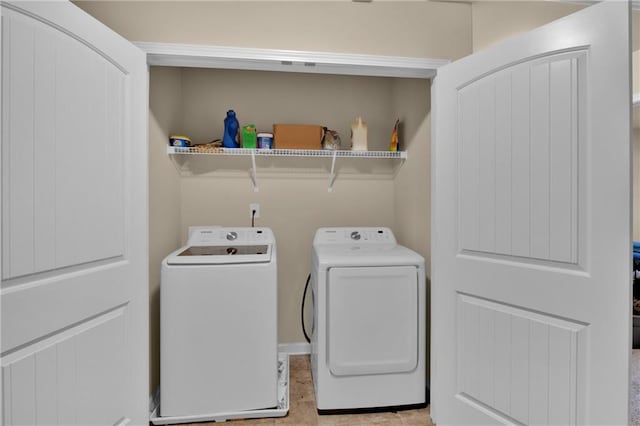 laundry area with washing machine and dryer