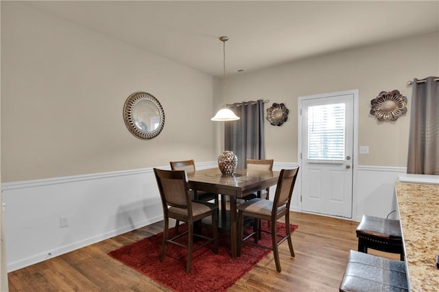 dining room featuring wood-type flooring