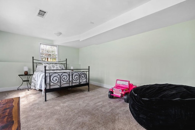 bedroom featuring carpet floors, baseboards, and visible vents