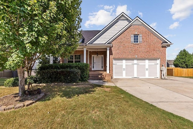 view of front facade with a front lawn and a garage