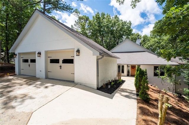 145 Mount Shasta Ln, Johns Creek, GA 30022 - view of front of property with stucco siding, an outdoor structure, a chimney, and driveway