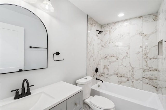 full bath featuring vanity, toilet, and shower / bathtub combination