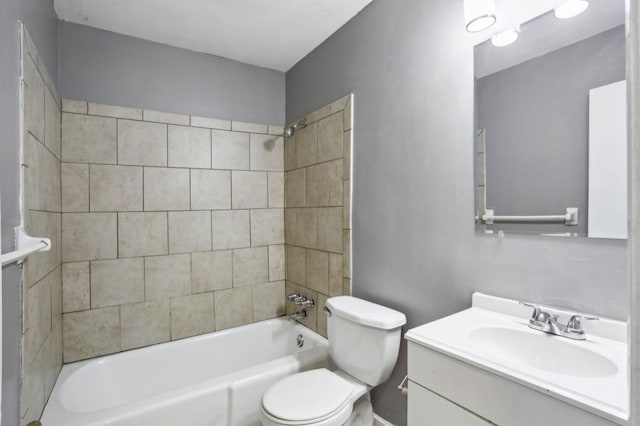 bathroom with vanity, shower / tub combination, and toilet