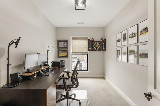 office space with light colored carpet