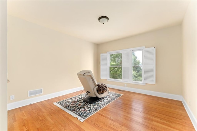 living area featuring hardwood / wood-style flooring