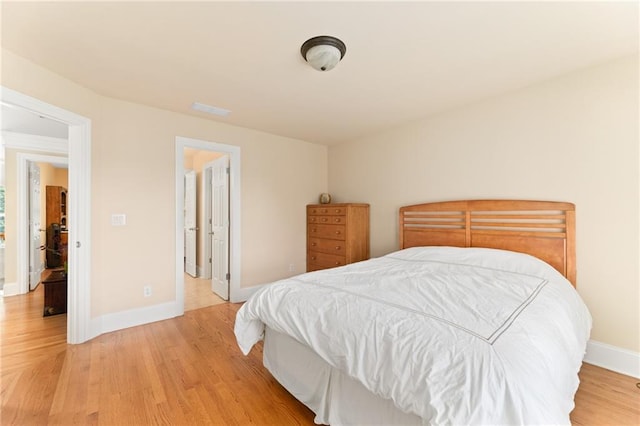 bedroom featuring light hardwood / wood-style flooring