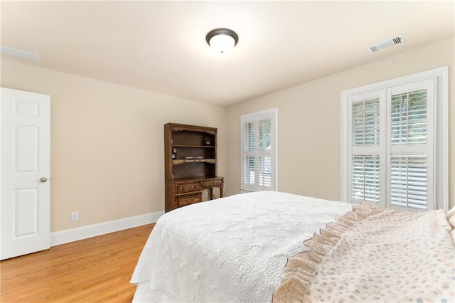 bedroom featuring hardwood / wood-style floors