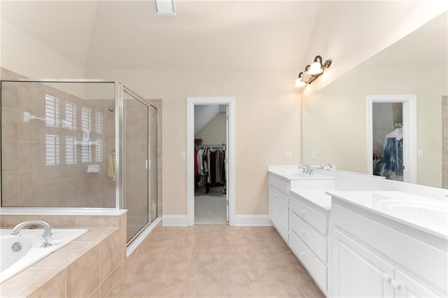 bathroom with lofted ceiling, tile patterned flooring, vanity, and independent shower and bath