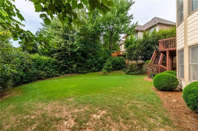 view of yard featuring a deck